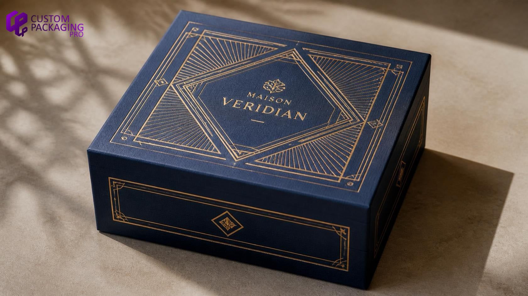 Close-up of gold foil debossing on premium textured custom packaging box displaying rich metallic depth Close-up of gold foil debossing on premium textured custom packaging box displaying rich metallic depth